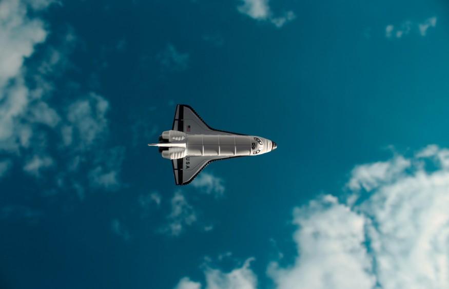 Space Aircraft under blue sky