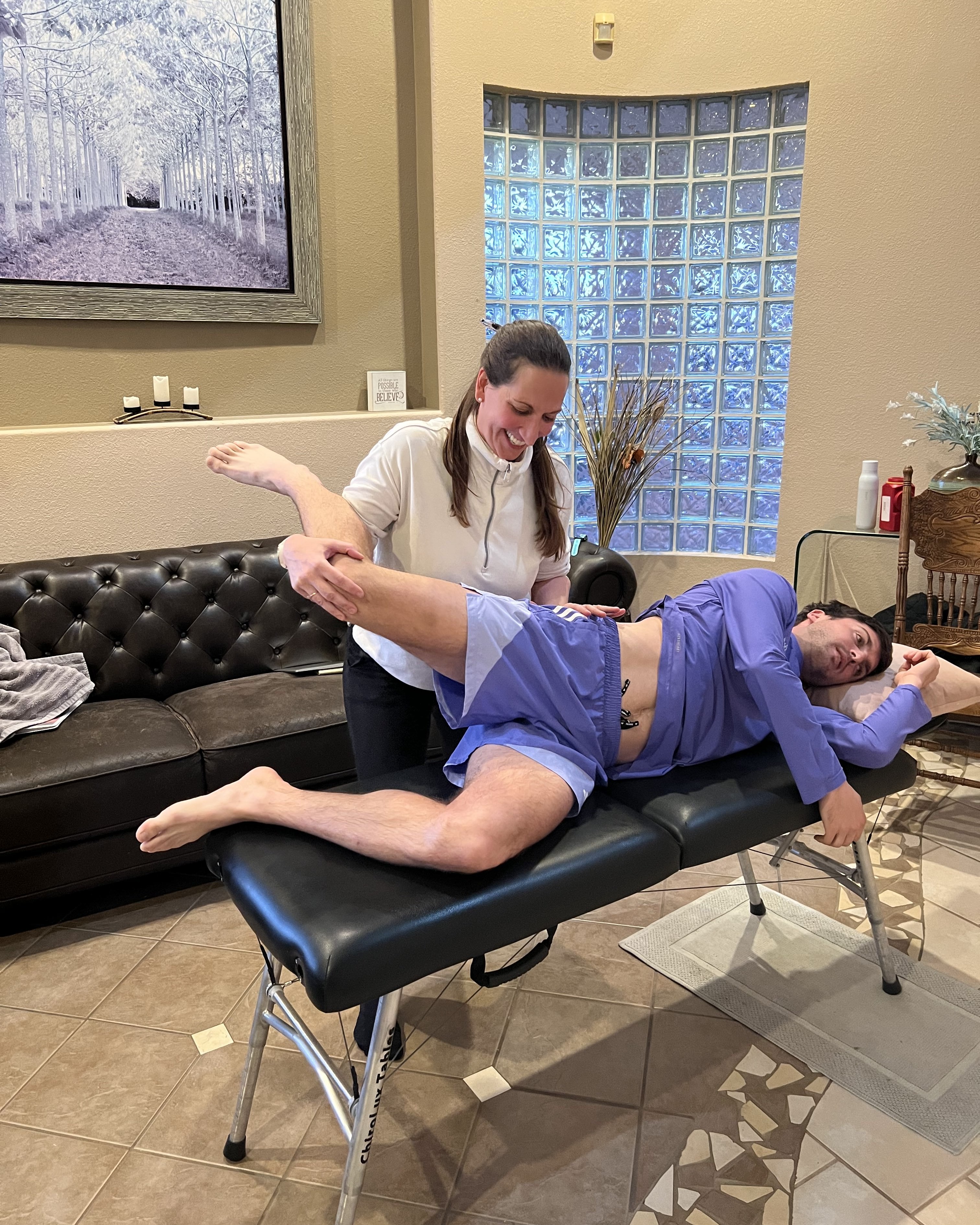 Dr. Kate Mihevc Edwards treating professional athlete Luciano