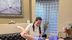 Dr. Kate Mihevc Edwards treating professional athlete Luciano