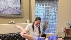 Dr. Kate Mihevc Edwards treating professional athlete Luciano