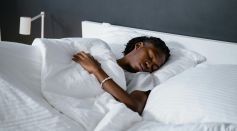 A Man Sleeping on the Bed