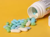 Mixed Pills Spilling Out of a Pill Bottle