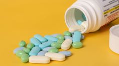 Mixed Pills Spilling Out of a Pill Bottle