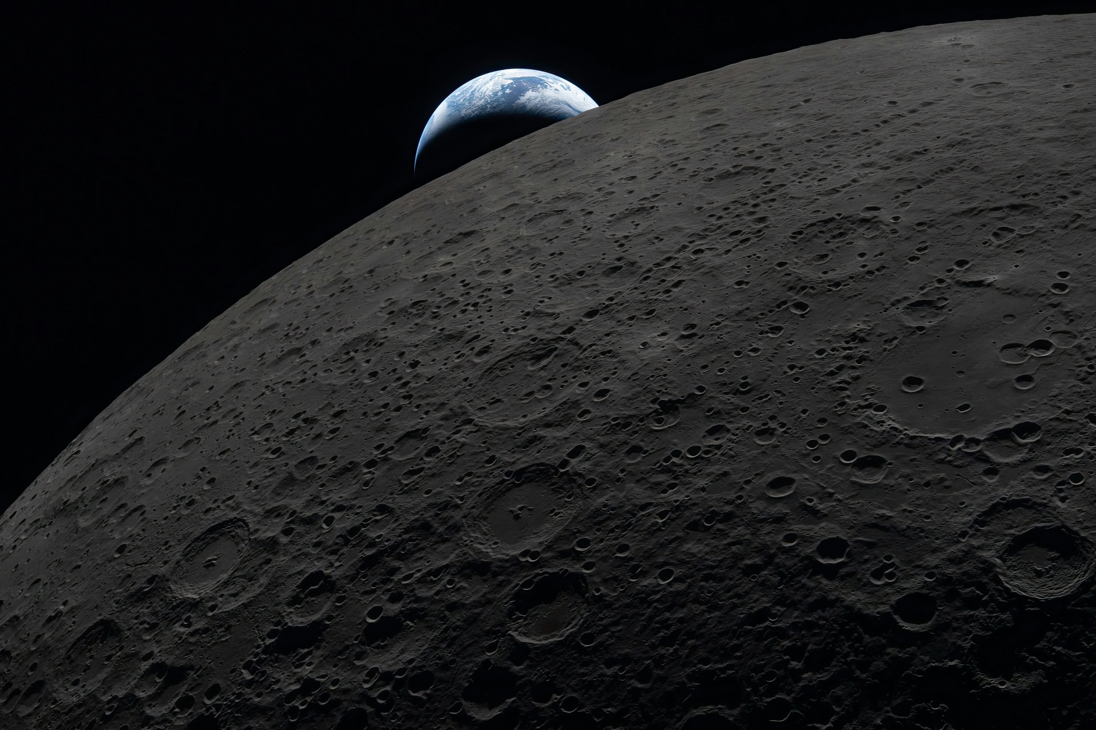 Photo: sciencetimes.com Earth Rising Over the Moon