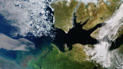 One can see the sea ice in the Canadian Archipelago's waterways, as well as well as the cracked sea ice found in the Beaufort Sea