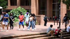 Virus is 'Not Under Control,' Especially with College Parties