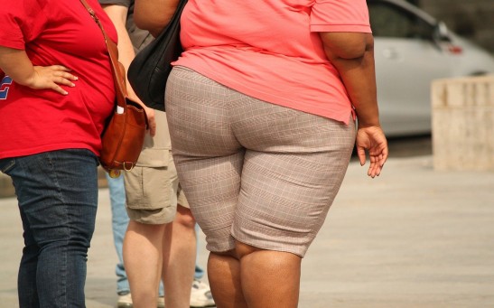 Stay-At-Home Adults Gained Two Pounds A Month During COVID-19 Pandemic, Study