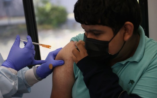 Science Times - COVID-19 mRNA Vaccine: Study Shows Efficacy of Single Dose in Reducing Symptom Duration