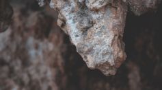tough-rock-in-stony-wild-cave-7084336
