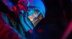 woman-in-a-spacesuit-with-blue-helmet-7672255