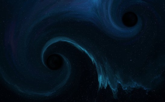 Two Supermassive Black Holes Circling Each Other in a Distant Galaxy Confirmed in New Observations of Bright Flares