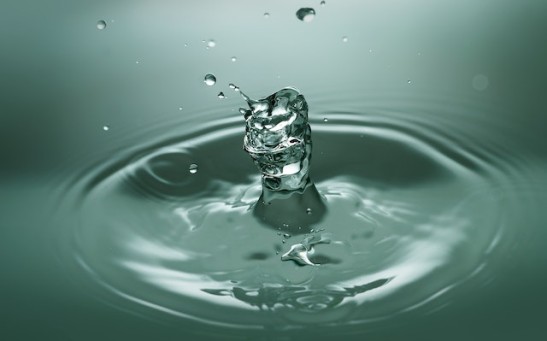 Pure Water Can Measure Antineutrinos From Nuclear Reactors at Large Distances