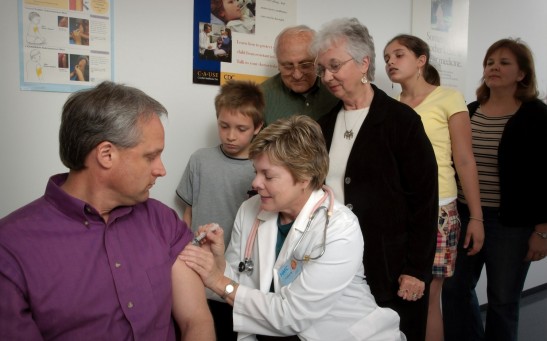 a group of people standing in a room